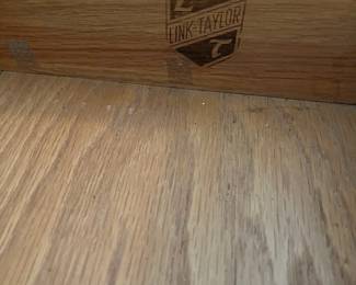 C100 - $40. Harvest Oak Corner Table. Measures 49" across at the widest point. Each corner comes out from the wall 35" x 25" tall.