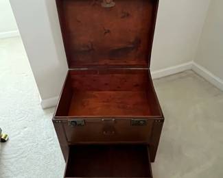 C12 - $10. Decorative Faux Leather Chest. Measures 23.5" x 14.5" x 18" tall. Trim around all edges need reglued - see photo.