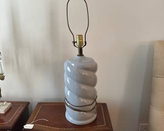 C63 - $15. Blue Ceramic Lamp. Measures 26" tall to top of harp.