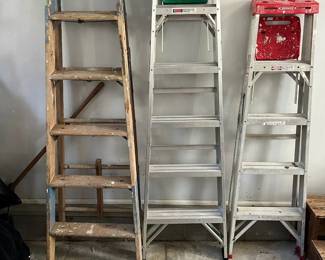 C143 - Left to Right. $40 Wooden 6' A Frame Ladder. $60 - 6' Werner Model 356. 225 lb rated. $40. Werner 5' Model 355. 200 lb rated.