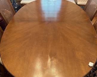 C33 - $150. Thomasville Dining Table & Chairs. 2 Captains & 6 Regular. Chairs need reupholstered. Table has minor damage to the finish on the top. Sturdy! Table is 68" long (no leaves in) x 44" wide x 29.5" tall. Set includes 2 leaves are each 18" wide.