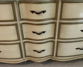 C9 - $150. Drexel Dresser with Mirror. Measures 63.5" x 22.5" deep x 34.5" tall. Mirror is 44.5" x 37". Minor crazing on the paint on the top.