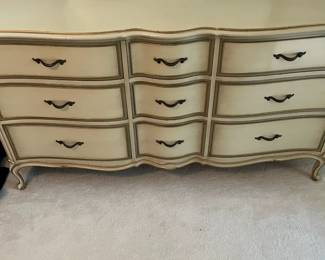 C9 - $150. Drexel Dresser with Mirror. Measures 63.5" x 22.5" deep x 34.5" tall. Mirror is 44.5" x 37". Minor crazing on the paint on the top.