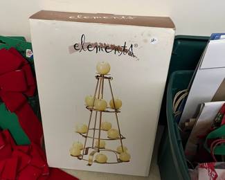 C135 - $12. Tree shaped candle holder.