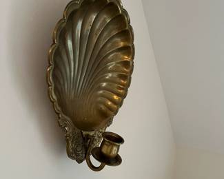 C111 - $15. Brass Candle Sconce. Measures 11.5" wide x 14" tall.