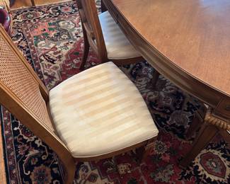 C33 - $150. Thomasville Dining Table & Chairs. 2 Captains & 6 Regular. Chairs need reupholstered. Table has minor damage to the finish on the top. Sturdy! Table is 68" long (no leaves in) x 44" wide x 29.5" tall. Set includes 2 leaves are each 18" wide.