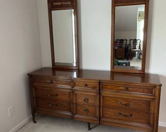 C30 - $175. Vintage Wooden Dresser. Measures 73.5" x 19" deep x 32.5" tall. Mirrors are 19.5" wide x 45" tall. All drawers slide. Very good vintage condition - just a few marks on the finish on the top.