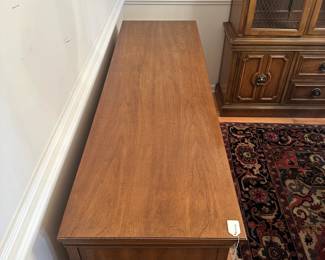 C32 - $100. Thomasville Buffet. Measures 66" wide x 20" deep x 32" tall. Sturdy and overall in good condition. Drawers slide, doors open. Has a water ring on the top right.