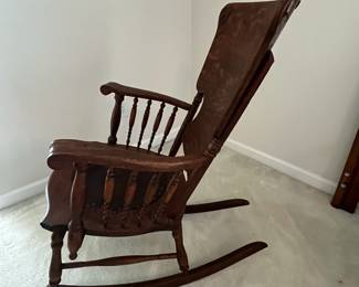 C13 - $50. Antique Rocker with Leather Seat. Outside of arms measures 24". Floor to top of back is 36". Seat is 20" wide x 16" deep x 18" floor to seat. Needs a bit of glue to hold a veneer piece on the back. Solid - great display piece!