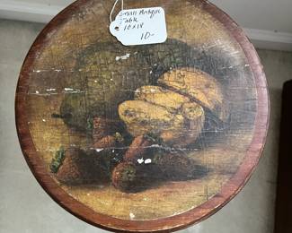 C123 - $10. Small wooden plant stand. 10" across. 18" tall.