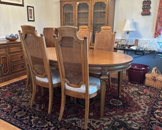 C33 - $150. Thomasville Dining Table & Chairs. 2 Captains & 6 Regular. Chairs need reupholstered. Table has minor damage to the finish on the top. Sturdy! Table is 68" long (no leaves in) x 44" wide x 29.5" tall. Set includes 2 leaves are each 18" wide.