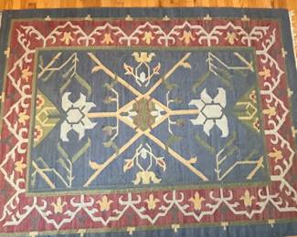C155 - $95. Area Rug Measures 61" x 82".