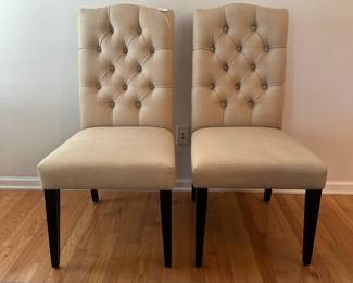 C55 - $40. Pair of Upholstered Dining Chairs. Measures 20" wide x 26" deep x 41" tall.