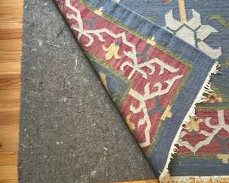 C155 - $95. Area Rug Measures 61" x 82".