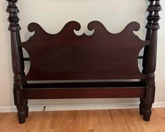 C150 - $50. Wooden Bed Frame. Measures 59" wide x 53.5" tall. Includes metal