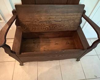 C2 - $275. Antique Oak Hall Tree. Bottom opens for storage. Hooks and mirror have been replaced at sometime. Otherwise - great antique condition. Measures 38" wide x 16" deep x 77" tall.