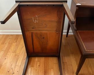 C57 - $75. Pair of Wood & Leather Top Side Tables. Measures 18" wide x 27.5" deep x 24.5" tall. Sturdy but they do show some signs of wear.