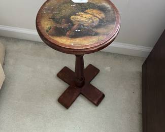 C123 - $10. Small wooden plant stand. 10" across. 18" tall.