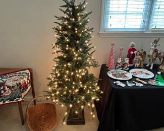 C103 - $30. Faux Christmas Tree measures 63" tall.