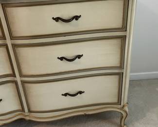 C9 - $150. Drexel Dresser with Mirror. Measures 63.5" x 22.5" deep x 34.5" tall. Mirror is 44.5" x 37". Minor crazing on the paint on the top.