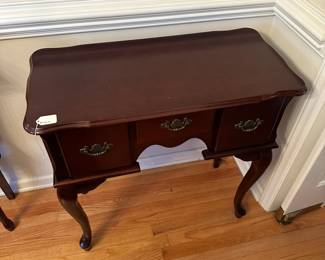 C43 - $60. Small Server/Entry Cabinet. Measures 32" wide x 16" deep x 31" tall. Pressed wood - very good used condition. 3 drawers all slide.