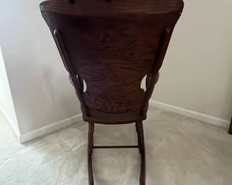 C13 - $50. Antique Rocker with Leather Seat. Outside of arms measures 24". Floor to top of back is 36". Seat is 20" wide x 16" deep x 18" floor to seat. Needs a bit of glue to hold a veneer piece on the back. Solid - great display piece!