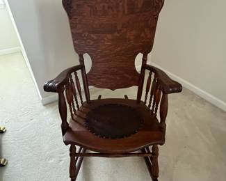 C13 - $50. Antique Rocker with Leather Seat. Outside of arms measures 24". Floor to top of back is 36". Seat is 20" wide x 16" deep x 18" floor to seat. Needs a bit of glue to hold a veneer piece on the back. Solid - great display piece!