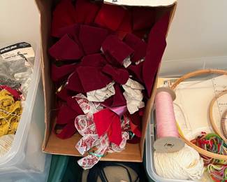 C127 - $10. Box of Red Bows.