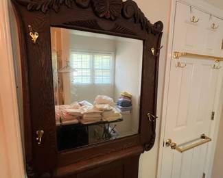 C2 - $275. Antique Oak Hall Tree. Bottom opens for storage. Hooks and mirror have been replaced at sometime. Otherwise - great antique condition. Measures 38" wide x 16" deep x 77" tall.