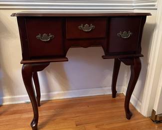 C43 - $60. Small Server/Entry Cabinet. Measures 32" wide x 16" deep x 31" tall. Pressed wood - very good used condition. 3 drawers all slide.