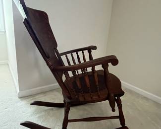 C13 - $50. Antique Rocker with Leather Seat. Outside of arms measures 24". Floor to top of back is 36". Seat is 20" wide x 16" deep x 18" floor to seat. Needs a bit of glue to hold a veneer piece on the back. Solid - great display piece!