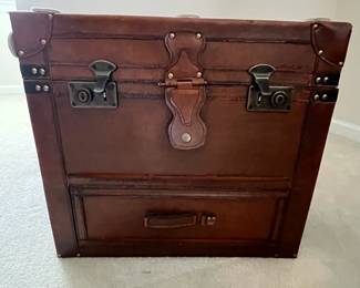 C12 - $10. Decorative Faux Leather Chest. Measures 23.5" x 14.5" x 18" tall. Trim around all edges need reglued - see photo.