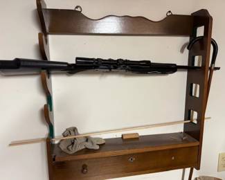 Gun rack. BB guns. Air rifles. Bamboo fly rods. 