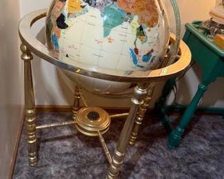 Semi-precious stone inlay and brass globe. 