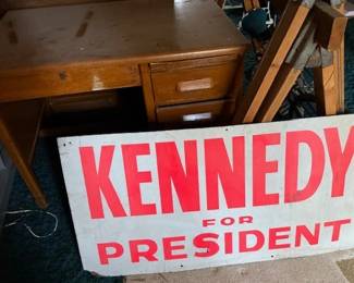 Looks like it is vintage. Wood sign. 