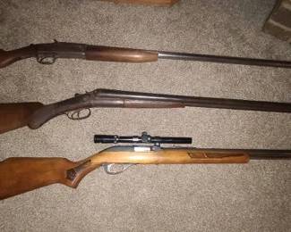 Side by side. 12 gauges. Marlin Glenfield No. 60 .22 semi auto.
