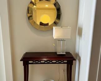 Bombay Co. console table (@ W36XD123xH31) .  Williams & Sonoma Planter.   Bevelled accent mirror. 