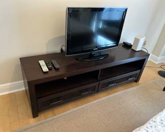 Floridian Furniture Entertainment Center (@65Lx18Dx20H).  Bottom drawers have cane woven fron panel. TV: Samsung 37” :  $50 .  Rug measures 108”x72 but needs cleaning.  
