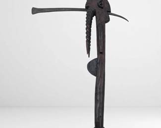 An Antique African Ceremonial Iron Adze Depicting A Crowned Man With Incised Fish On Each Side
