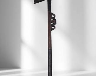 An Antique African Ceremonial Iron Adze With A Carved Wood Face On The Handle
