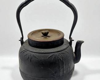 A Japanese Meiji Period Signed Cast Iron Tetsubin With Brass Lid
