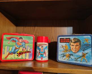 Vintage comic book lunch boxes.