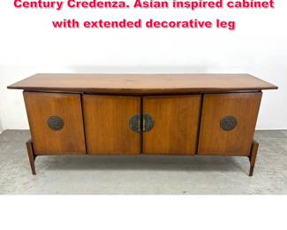 Lot 273 HELEN HOBY BAKER Four Door Mid Century Credenza. Asian inspired cabinet with extended decorative leg