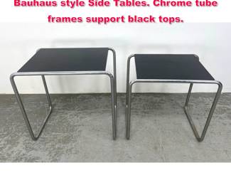 Lot 108 2pc Nesting Marcel Breuer Tables. Bauhaus style Side Tables. Chrome tube frames support black tops. 