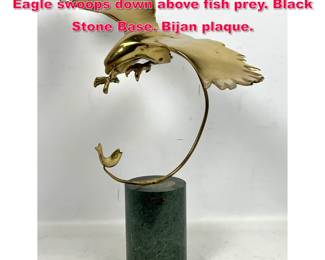 Lot 311 BIJAN Brass Modernist Sculpture. Eagle swoops down above fish prey. Black Stone Base. Bijan plaque. 