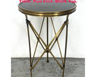 Lot 437 Brass Gueridon Regency style Side Table. Paw Feet. Black Top. 