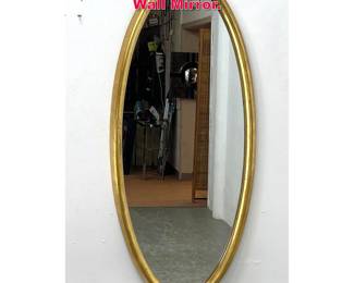 Lot 181 Elongated Oval Gilt Wood Modernist Wall Mirror. 