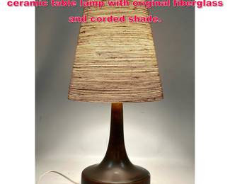 Lot 319 Gunnar and Lotte Bostlund brown ceramic table lamp with original fiberglass and corded shade.