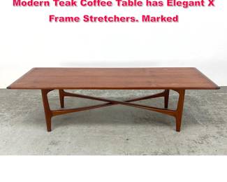 Lot 94 Folke Ohlsson coffee table. Danish Modern Teak Coffee Table has Elegant X Frame Stretchers. Marked 