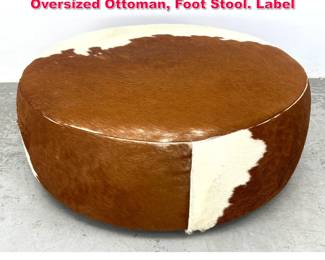Lot 527 ROOM and BOARD Animal Hide Oversized Ottoman, Foot Stool. Label